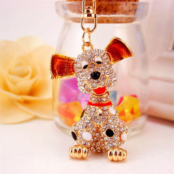 Llavero perrito dalmata metal dorado esmaltado con cristales